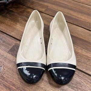 CROCS womans flats. Offwhite/black. New condition. Size 7. Perfect for daily or